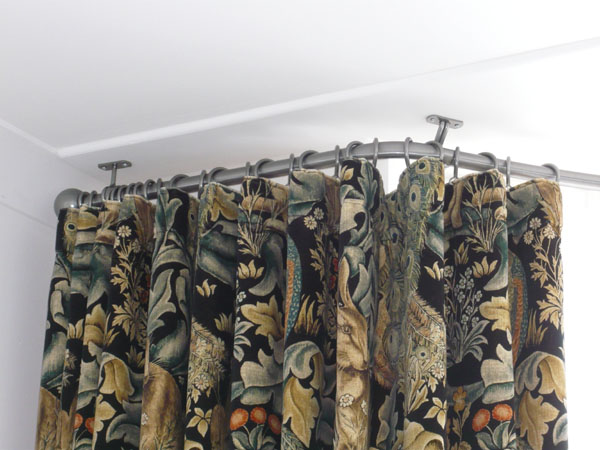 William Morris curtains with ungathered heading to display the fabric