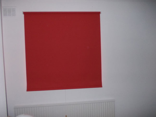 roller blind lowered to completely obscure the window