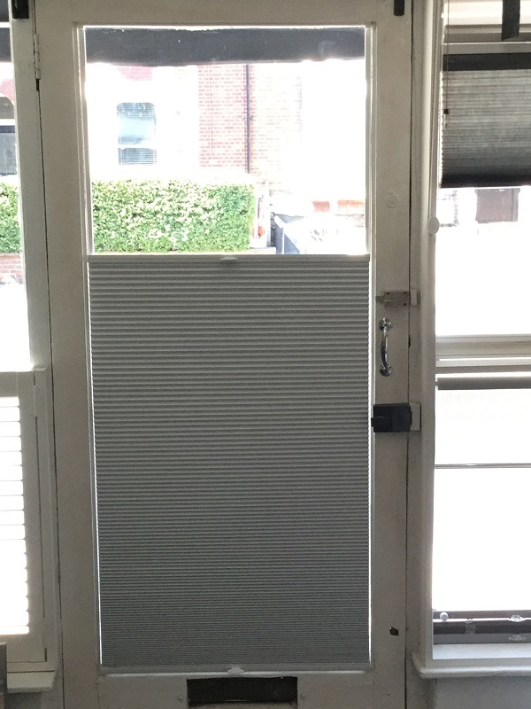 Trufit duette blind covering bottom half of glass door