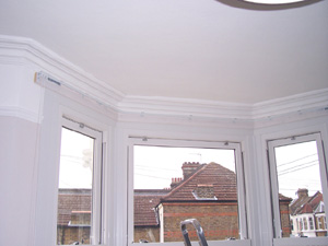 Bay window corded steel curtain track West Hampstead