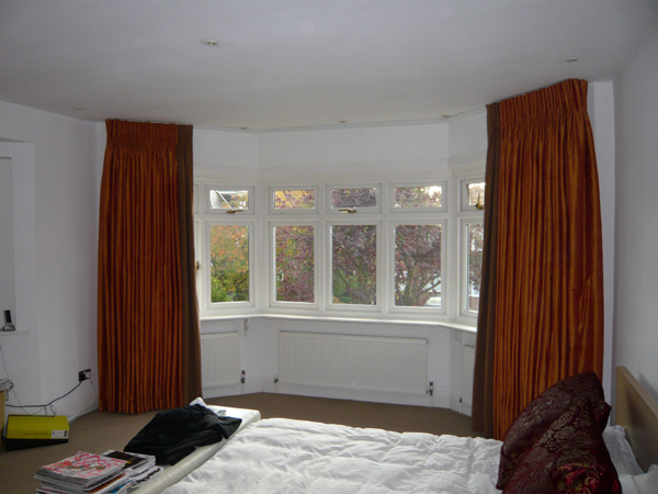 Silk curtains with linen leading edges