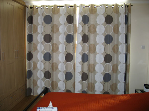 Eyeletted curtains with blackout lining