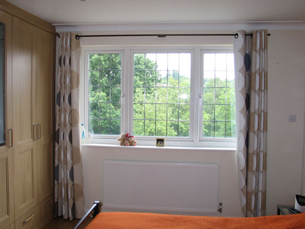 Eyeletted curtains with blackout lining