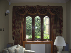Curtains with swags and tails for a more traditional look Highgate