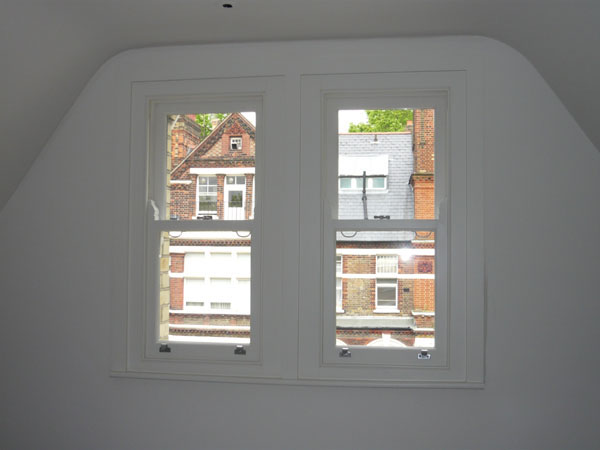  pair of windows - side by side - before blinds are fitted