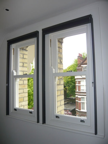 Honeycomb Blackout Blinds installed London both blinds now have side channels