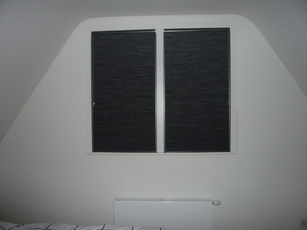 Blackout Duette blinds with side channels - here photographed with flash