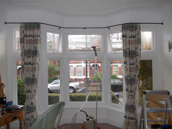 19mm wall to wall reverse bend baypole fitted in London now we dress the pleats and tie the curtains to set the pleats