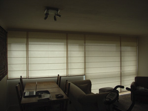 an entire wall of roman shade blinds of different drops Crouch End