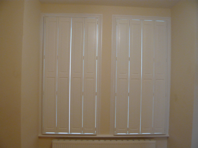 Solid panel bi-fold shutters 