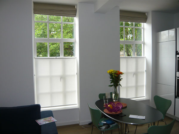 bottom up roller blinds with two height settings at their upper height