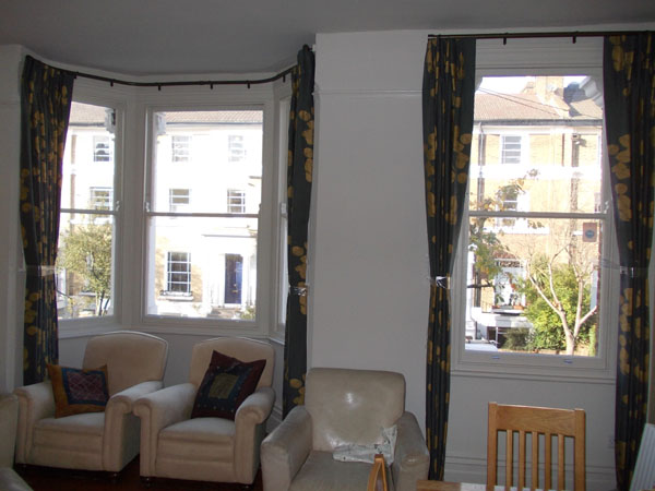 Jocelyn Warner curtains with antique bronze metropole
