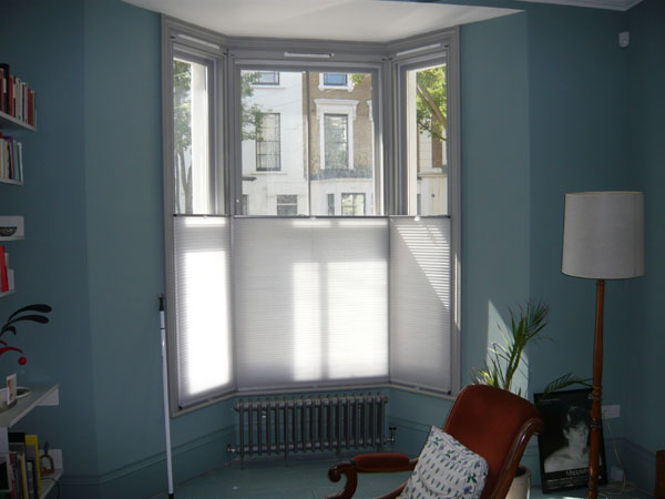 top down bottom up duette blinds covering bottom half of North London bay window