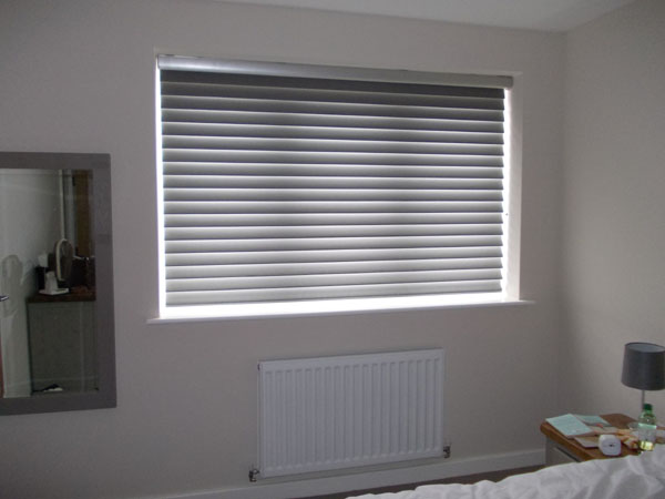 Luxaflex Bon Soir Silhouette shade lowered for room darkening effect