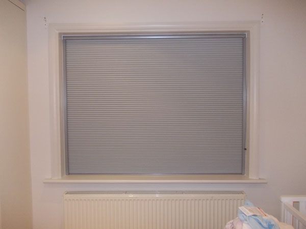 Luxaflex Duette blind lowered in its side channels