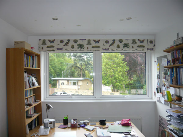 roman blind in Sanderson Cocos fabric stacked at the top of the window
