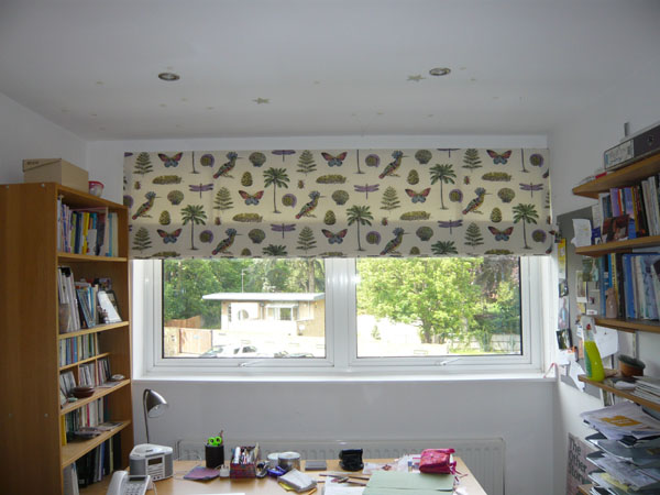 roman blind in Sanderson Cocos fabric covering part of window