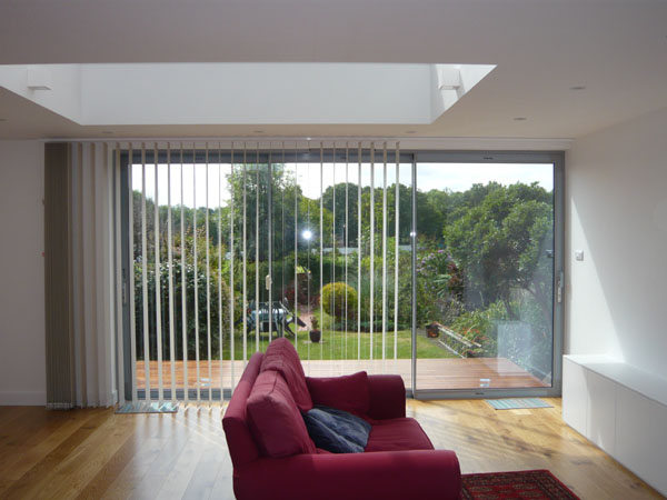 blind being drawn across the patio doors