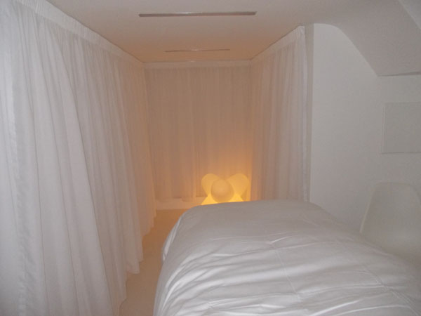 treatment room with voile curtains in soft light