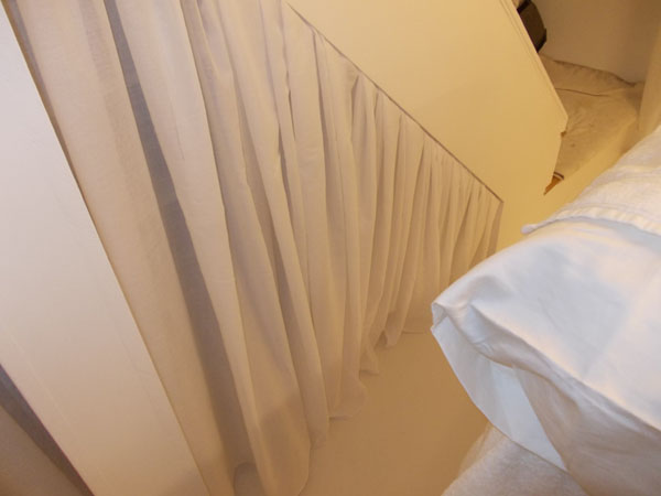 voile curtain specially shaped for triangular opening under stairs
