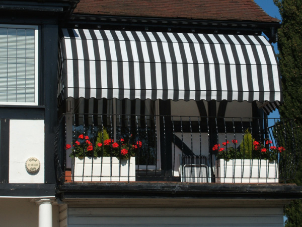 Dutch canopy neatly matched to building