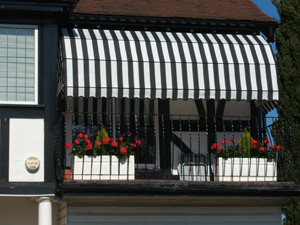 Dutch canopy neatly matched to building in Herts