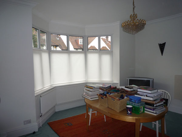 Bottom Up blinds fitted in Hampstead Golders Green North London. With deep window sills and little stacking space for curtains the lady wanted to maintain her sense of space and simplicity, whilst getting away from the goldfish bowl effect.