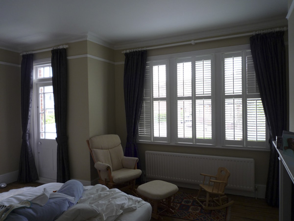 Interlined blackout curtains white wood pole white wooden shutters for glare and privacy