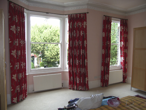 19mm baypole and straight with interlined blackout curtains pinch pleated in Romo fabric
