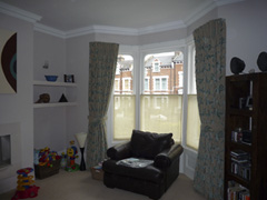 Harlequin curtains, interlined and pinch pleated on corded steel bay track Highgate