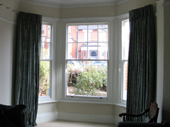 French cloque work in silk, interlined and pinch pleated curtains, corded steel bay window track Hornsey