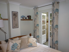 Romo curtains interlined and eyeletted on a pole Tufnell Park