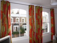 marimekko gingko interlined and eyeletted on poles Stoke Newington