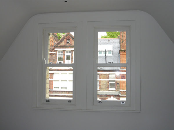 pair of windows - side by side - before blinds are fitted