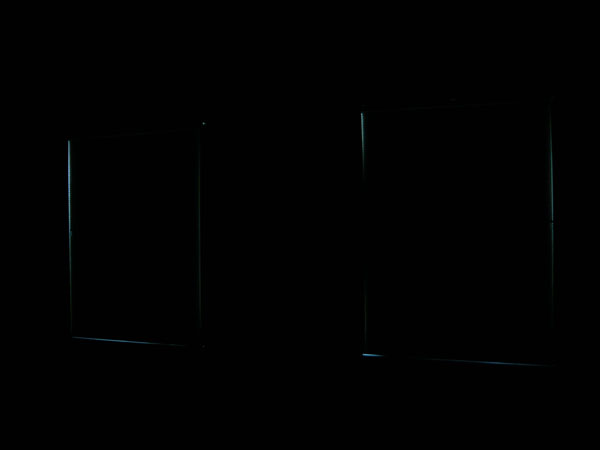 duette blinds with side channels showing some reflected light off the insides of the side channels