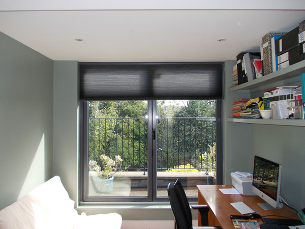 Duette blinds fitted at modern folding doors in London