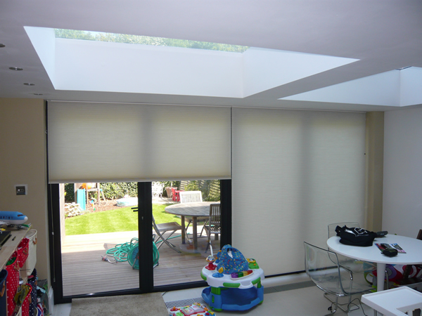 Duette blinds fitted at modern folding doors in London