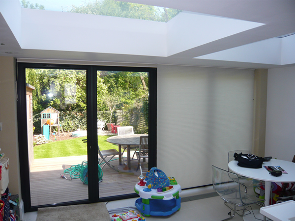 Duette blinds fitted at modern folding doors in London