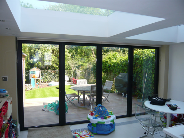 Duette blinds fitted at modern folding doors in London