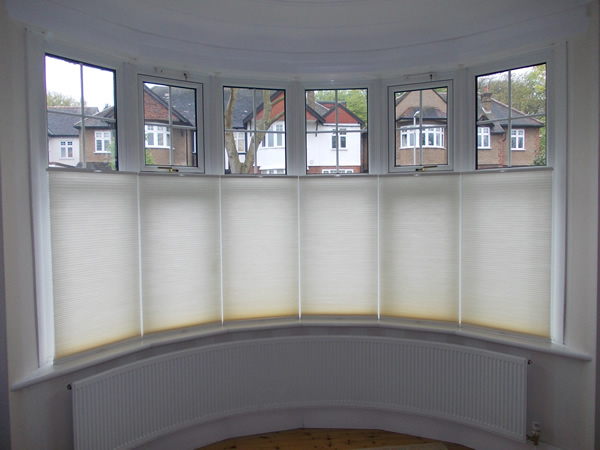 Top down - bottom up Luxaflex duette blinds at a bow window