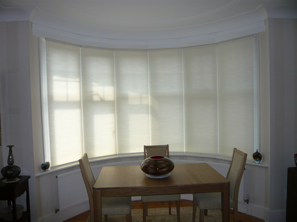 Top down - bottom up Luxaflex duette blinds at a bow window