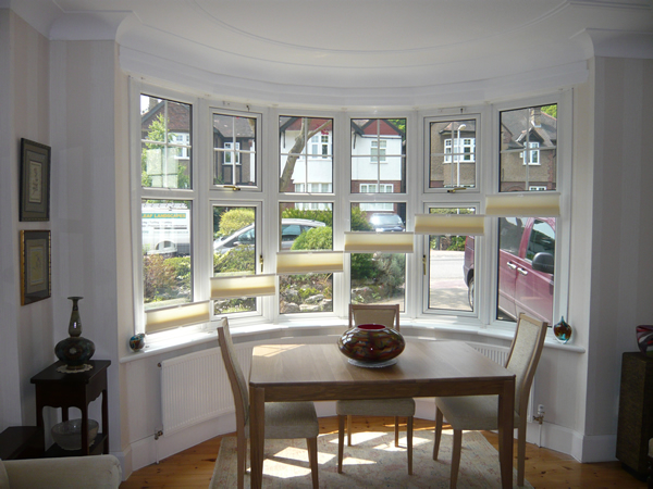 Top down - bottom up Luxaflex duette blinds at a bow window