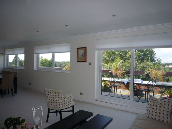 An elegant minimalist solution to glare in this penthouse apartment in Hendon North London