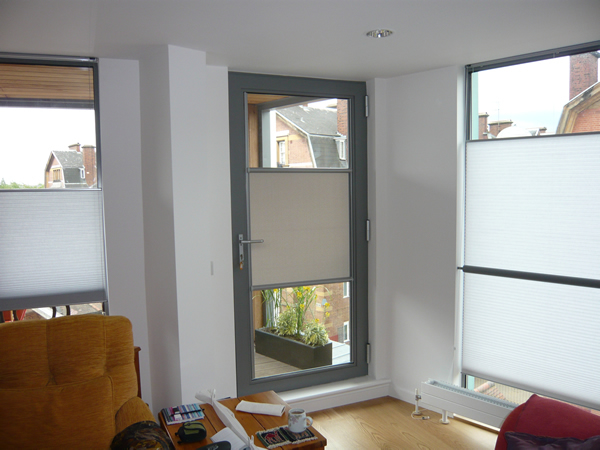 Luxaflex Nano blind fitted to a door in London, blind covering the middle of the door