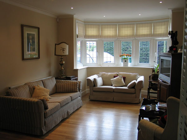 Linen roman blinds in bay window