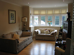 linen roman blinds in bay window Totteridge