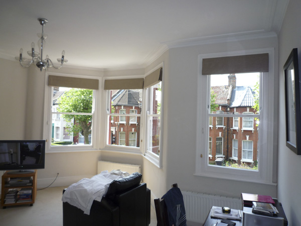 Very simple Roman Blinds in a plain linen.