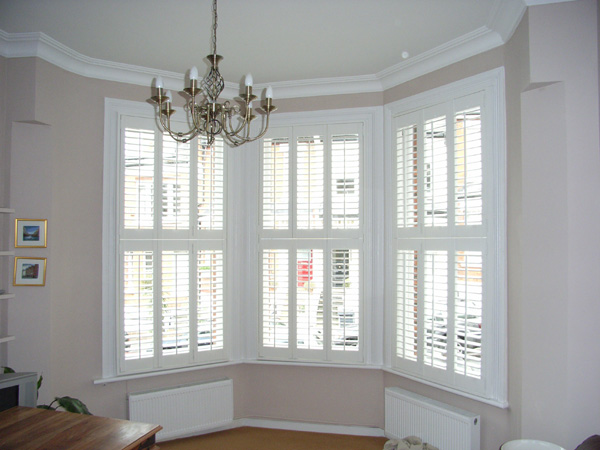 silk white tier on tier shutters with 63mm louvres 
