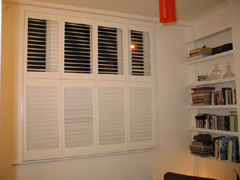 Tier on tier shutters with 63mm louvres and hidden tilt rod Stroud Green