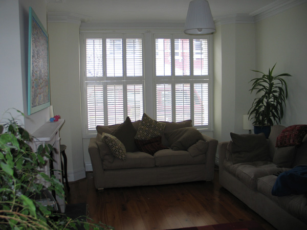 silk white shutters LLL and RRR tier on tier with 64mm louvres 